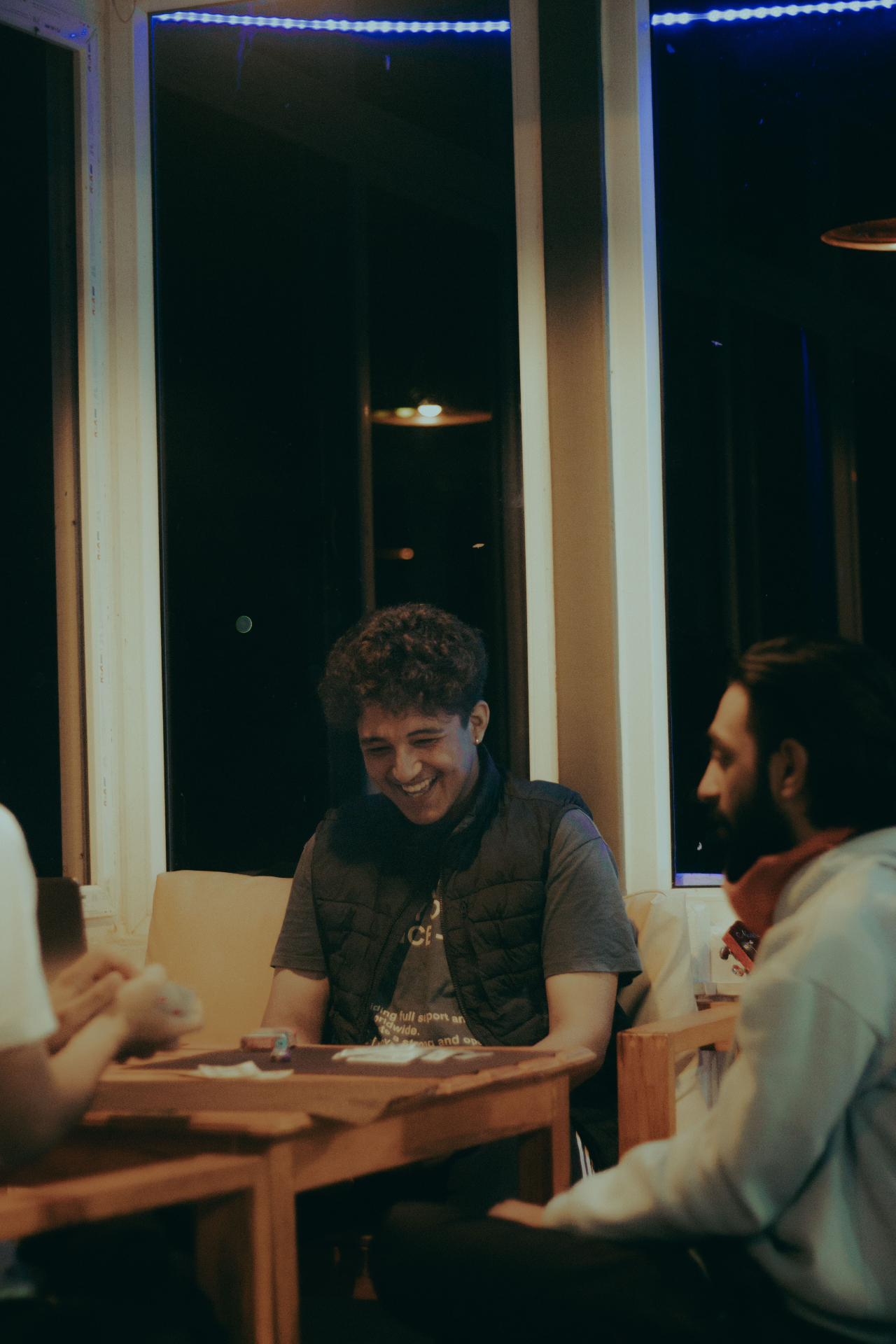 Mates chatting around a table